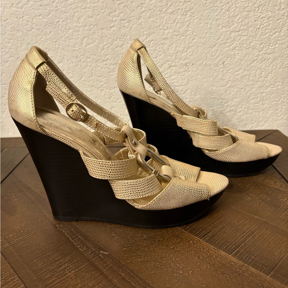Calvin Klein Gold and Black Wedge Sandals